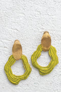 Handcrafted ceramic pieces in fusion with brass